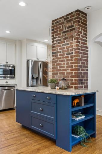 Blue island, stainless appliances and exposed brick