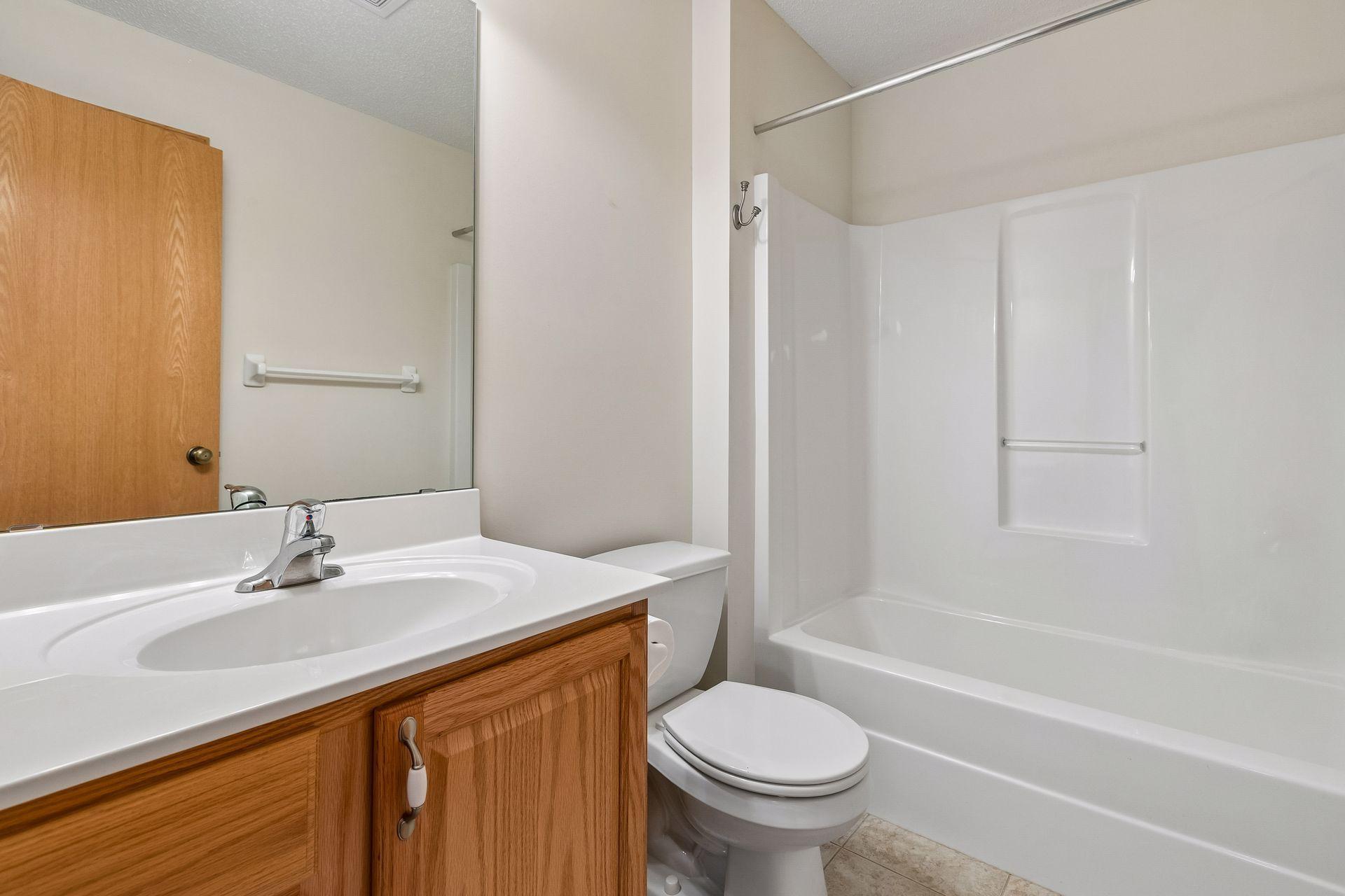 main level full bathroom next to spare bedroom