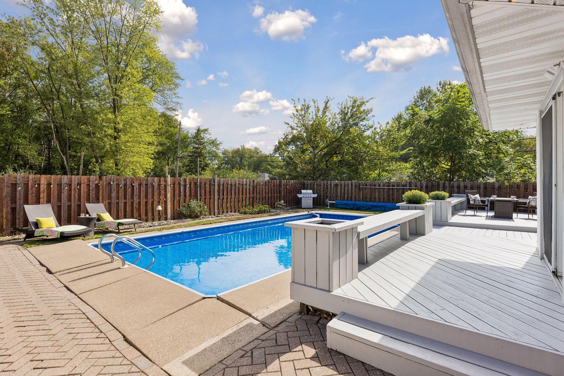 Cement Patio surrounding the Pool