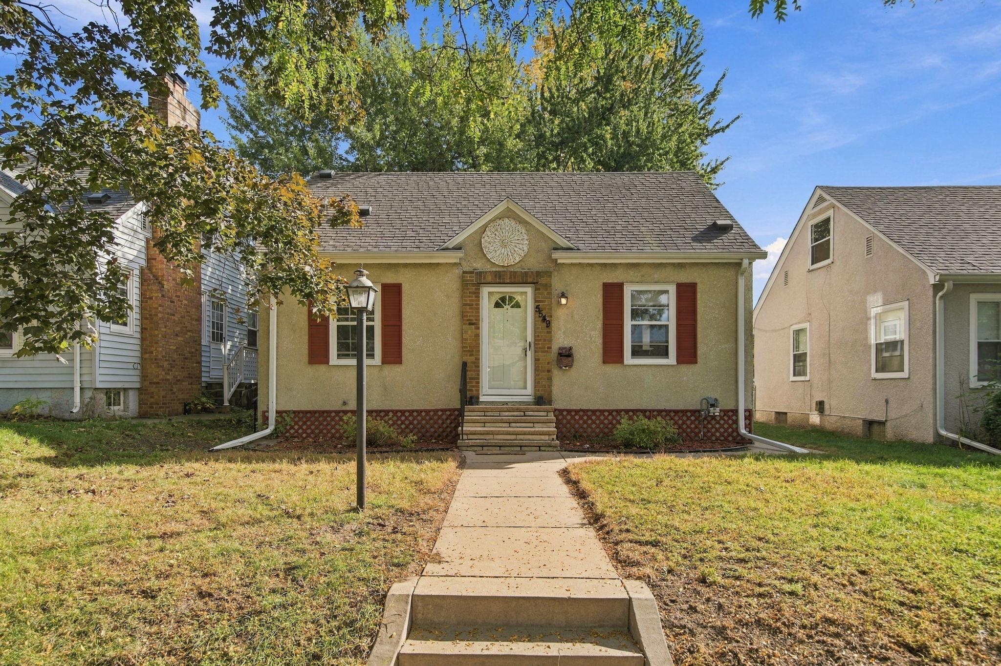 Enjoy the best of South Mpls Living in this bright, charming and well-maintained 1 1/2 story home in Morris Park.