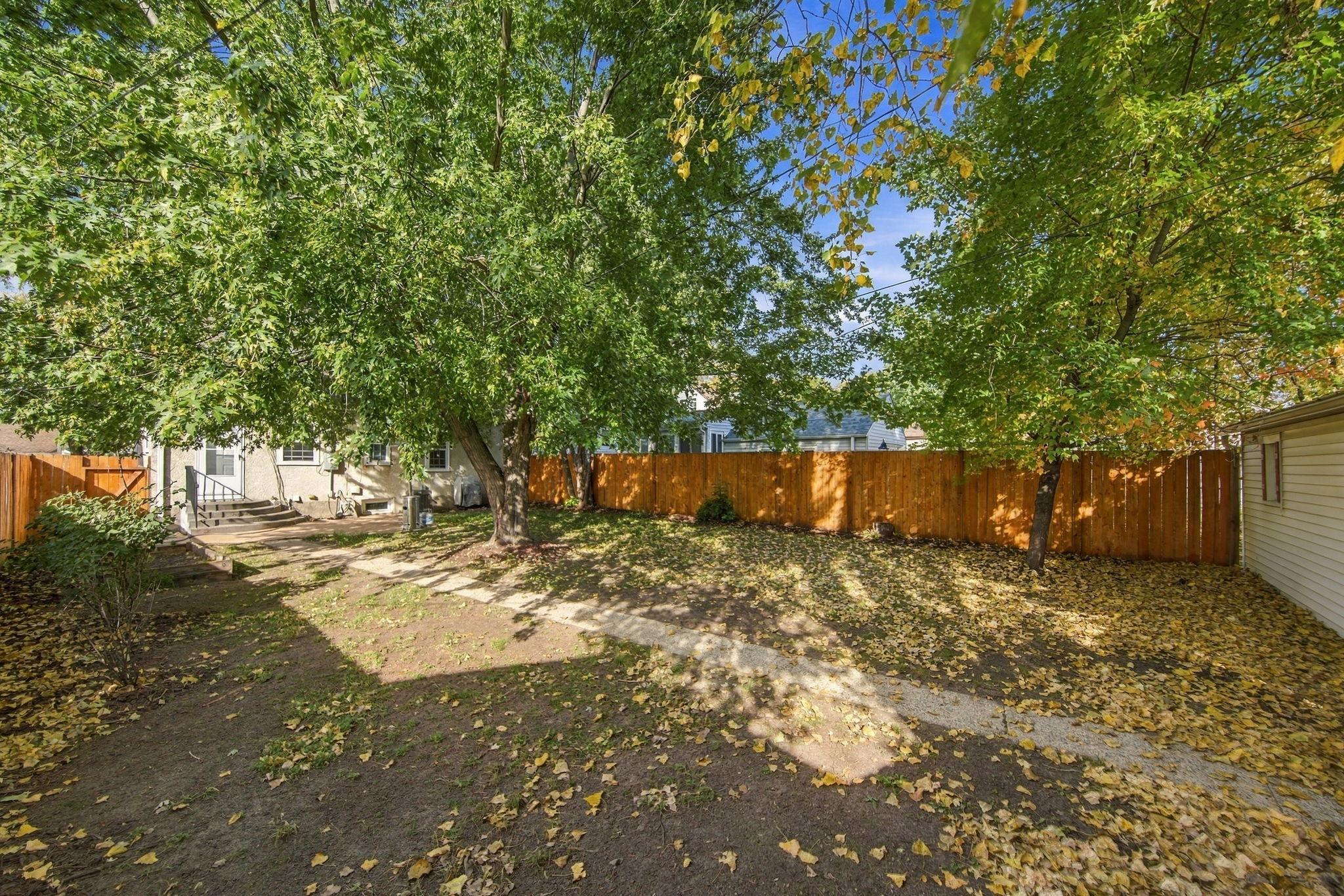 Spacious backyard, ideal for entertaining and providing plenty of room for children and pets to play. The current owners are also willing to leave the lawn mower for the new owners.