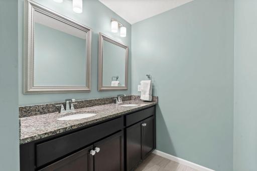 Upper Level Full Bathroom w/ Double Vanity.