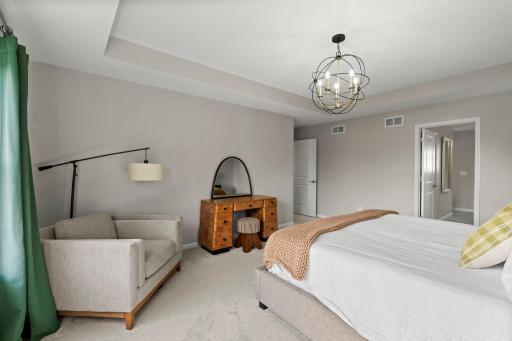 Upper Level Primary Suite w/ Tray Ceiling