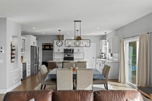 Dining Area Opens to Kitchen and Living Area