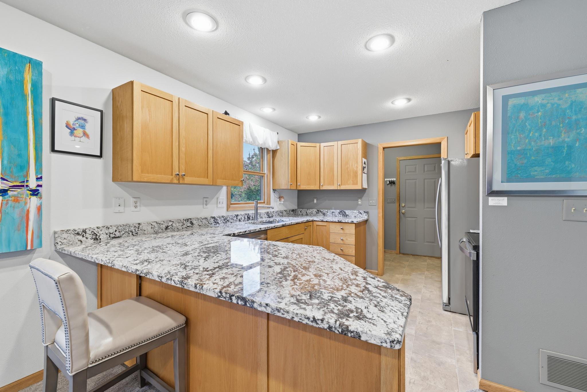 Inviting kitchen with granite counters