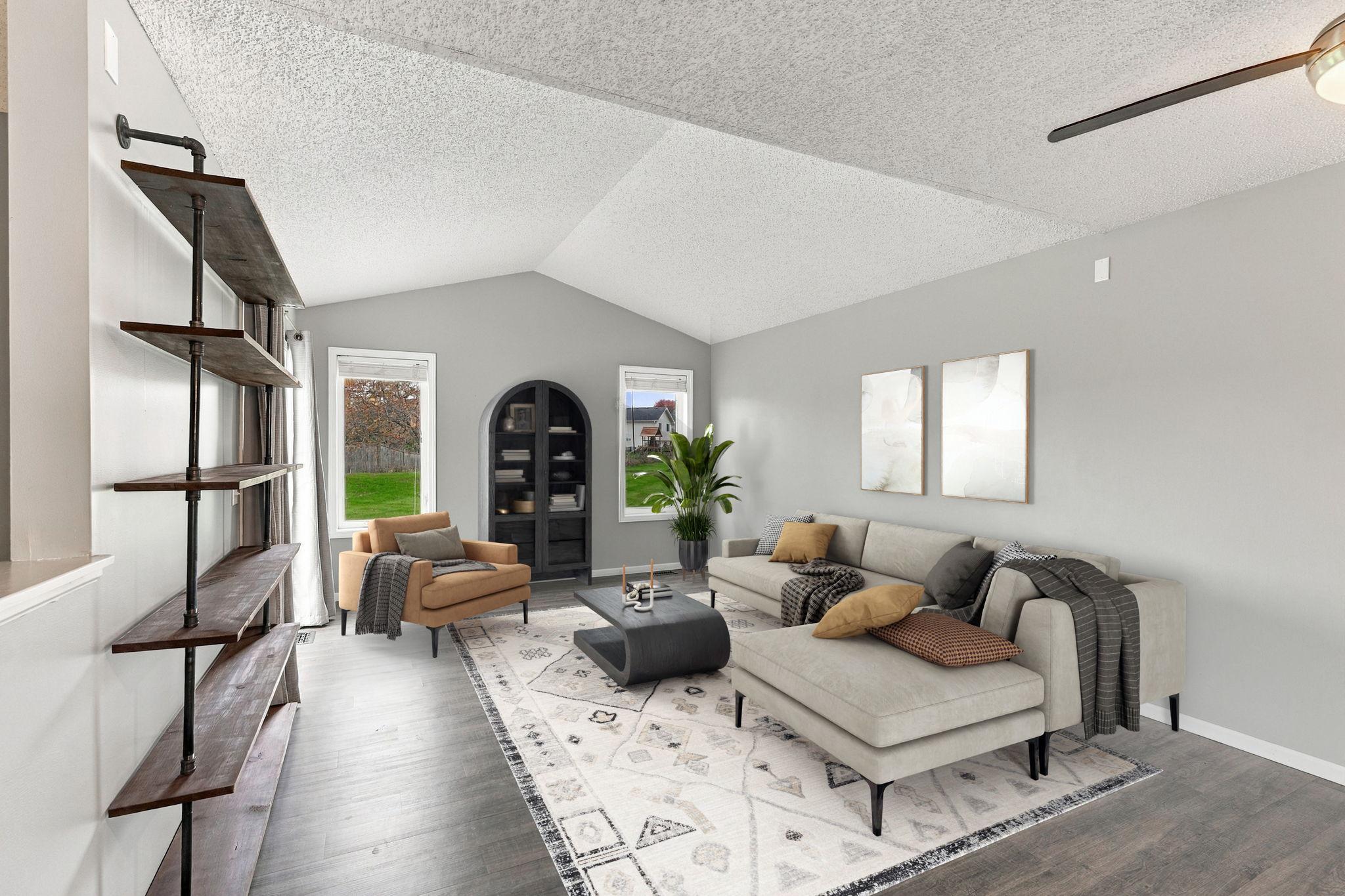 Fresh paint, newer carpet, and vinyl wood flooring, this home offers comfort and convenience throughout. (Virtual Staged)
