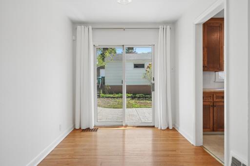 Sliding doors out to the paver patio â easy indoor-outdoor entertaining