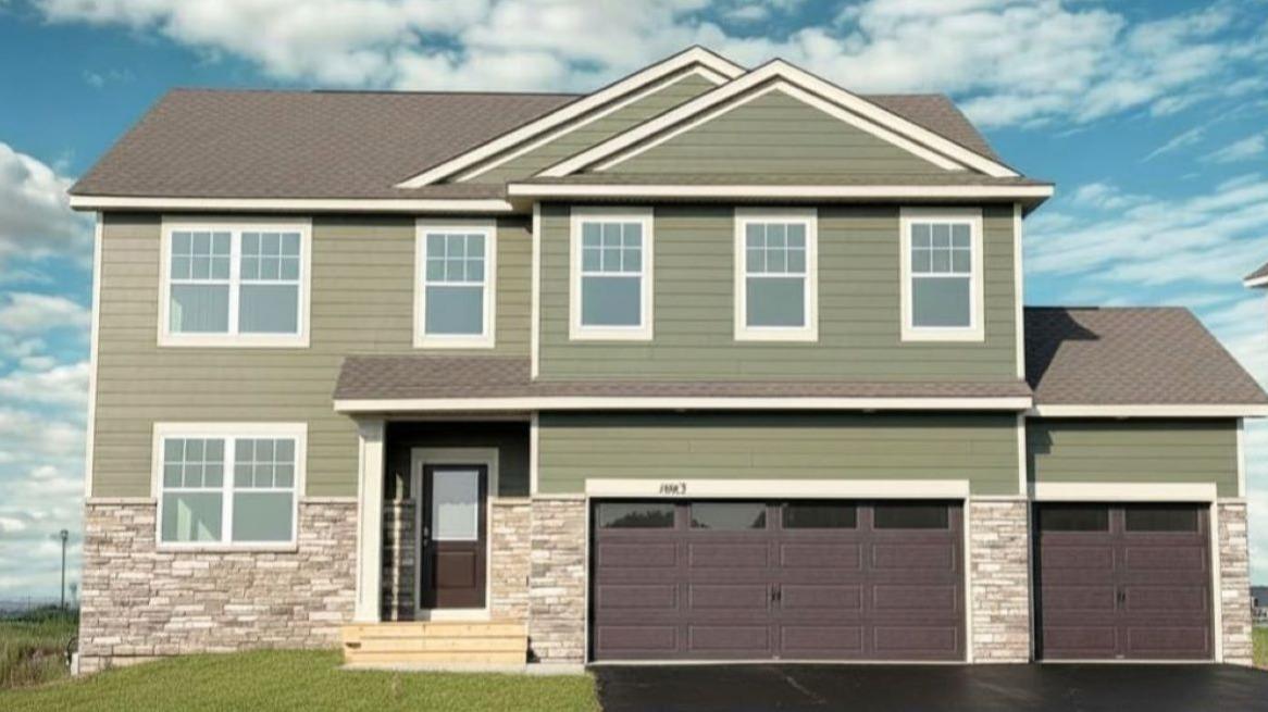 Welcome to the Adams II in Badger Heights. Photo of similar home.