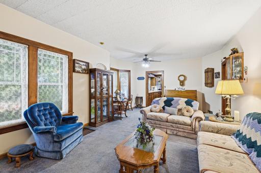Living room with view into the kitchen/dining areas