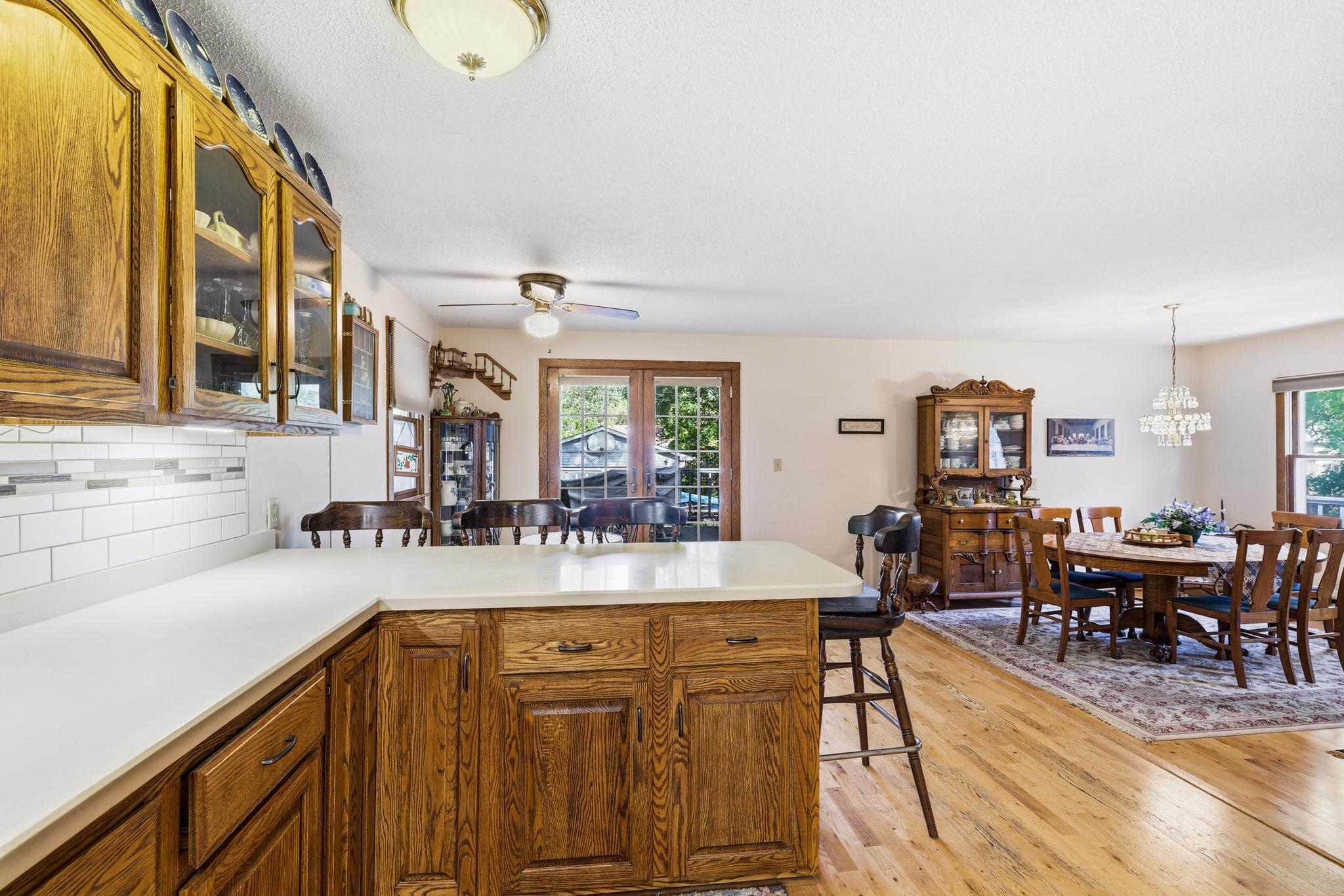 Breakfast bar & view into nook & formal dining area
