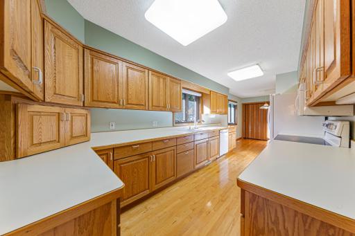Galley Kitchen with abundant Cabinetry and Counter Space