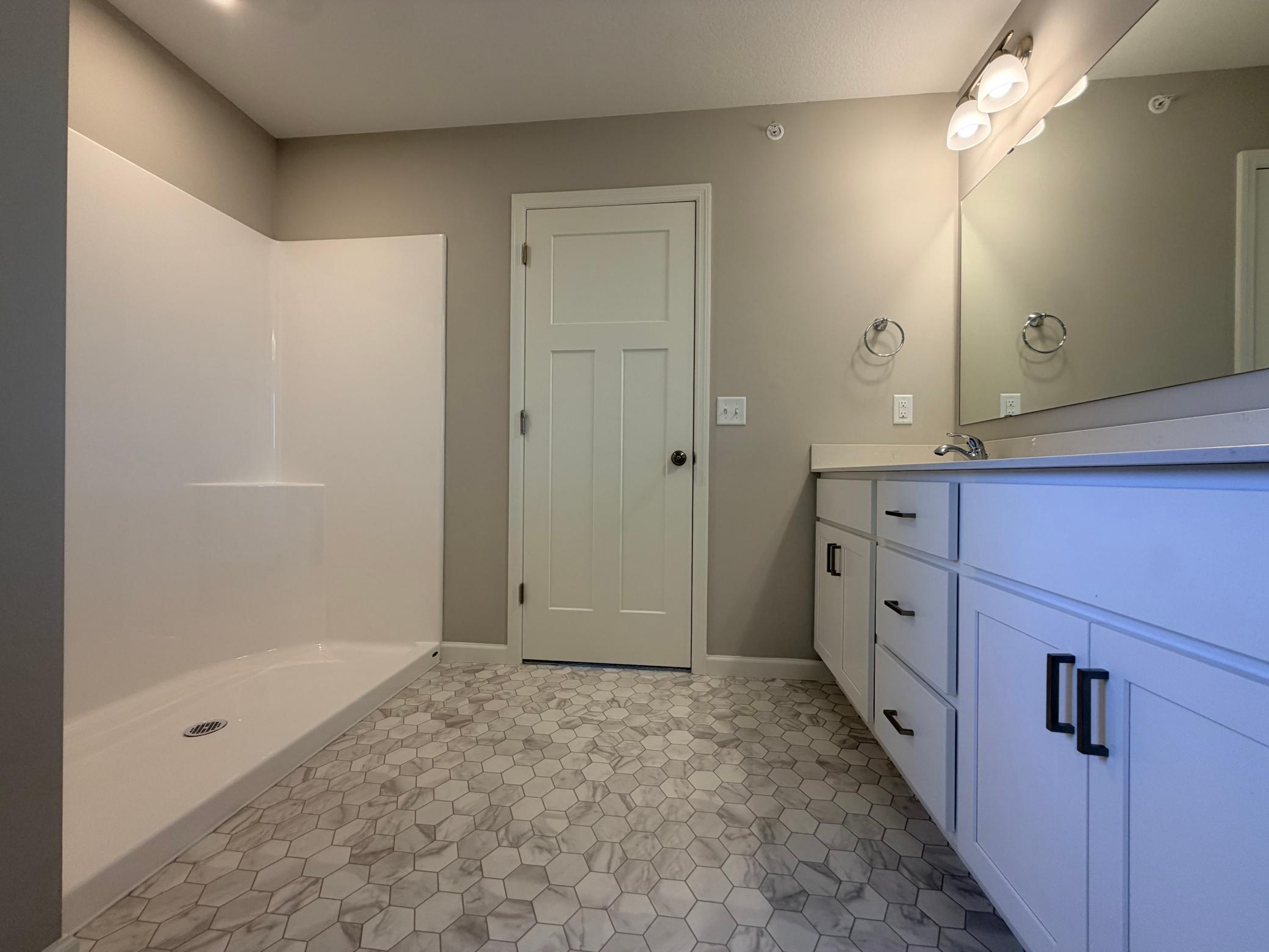 Easy to clean walk in fiberglass shower!