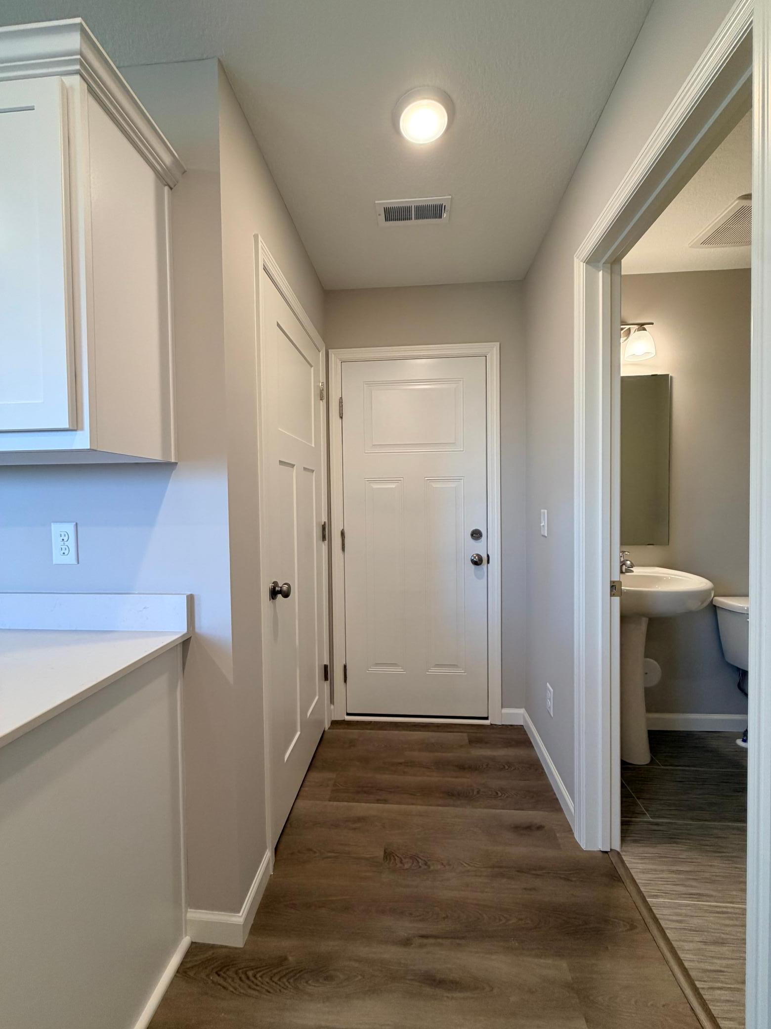 Garage access with closet.