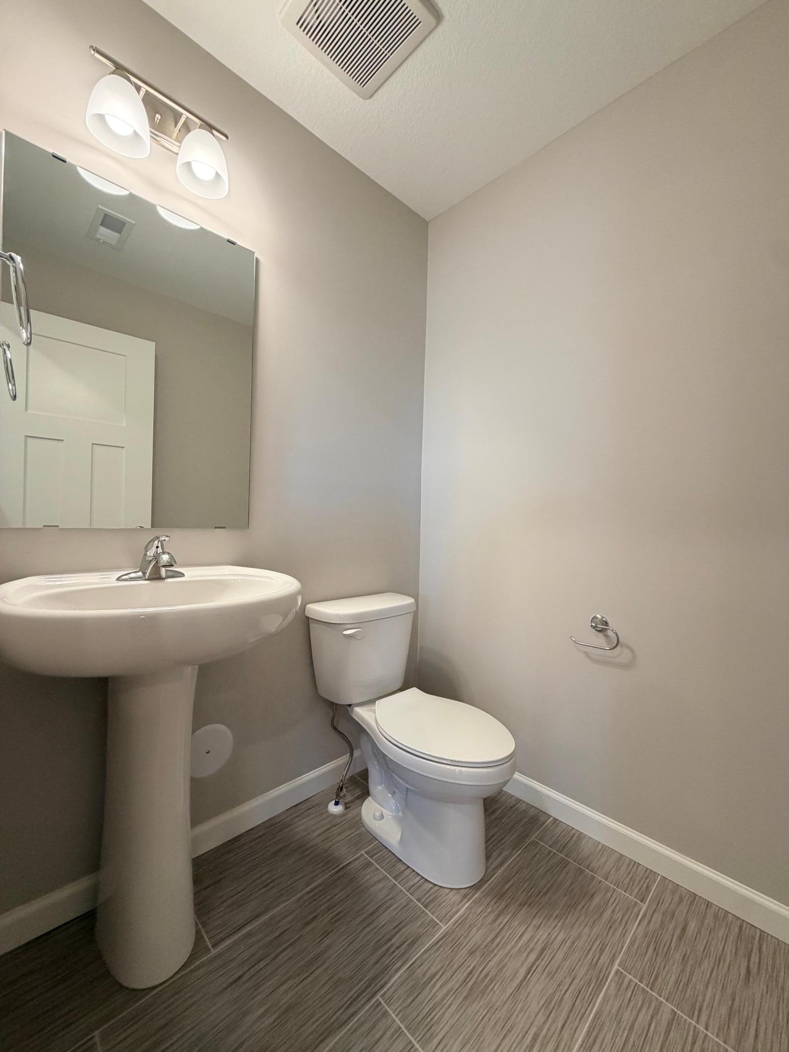 Powder bath tucked away for convenience.