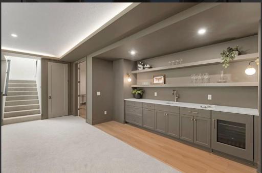 Lower level wet bar-not actual home, photos of model with same layout