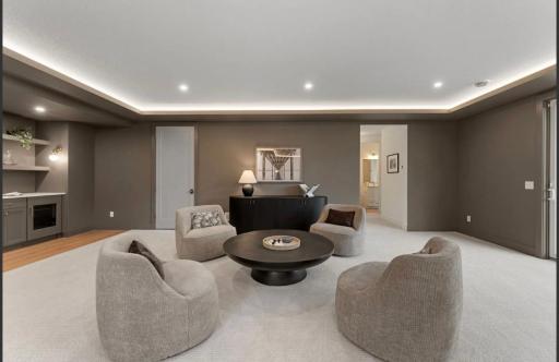 Lower level seating area-not actual home, photos of model with same layout