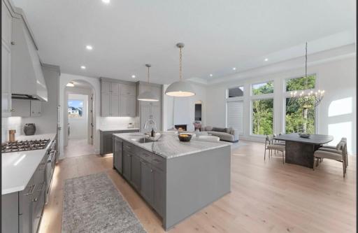 Kitchen with oversized island-not actual home, photos of model with same layout