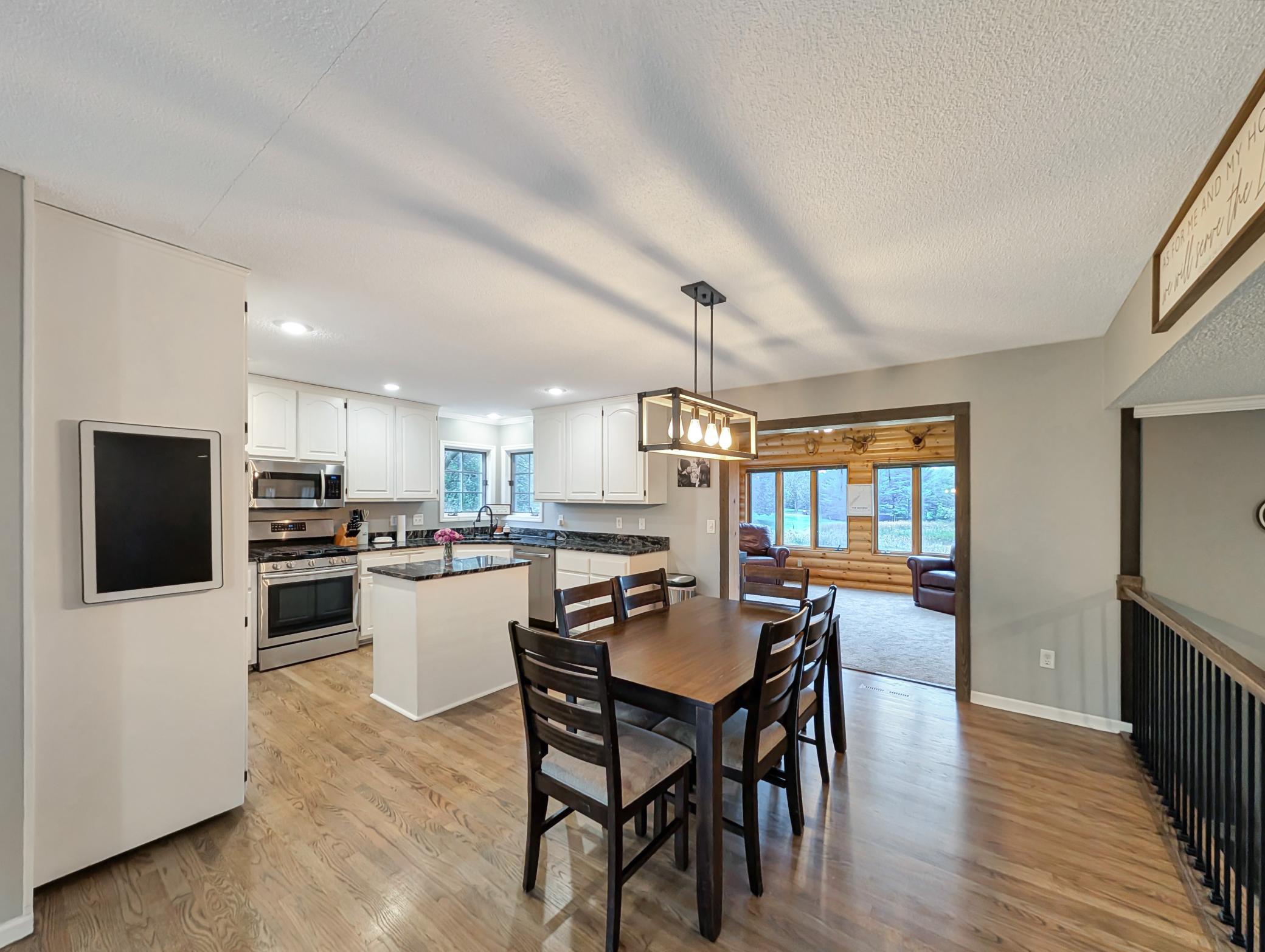 This cozy dining area right off the kitchen is convenient and spacious!