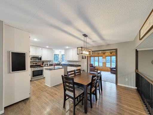 This cozy dining area right off the kitchen is convenient and spacious!
