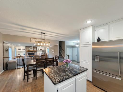 Room for pantry items right next to the fridge makes this convenient and functional as well as stunning.