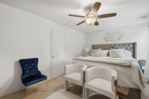Luxurious primary suite with walk in closet and primary bathroom