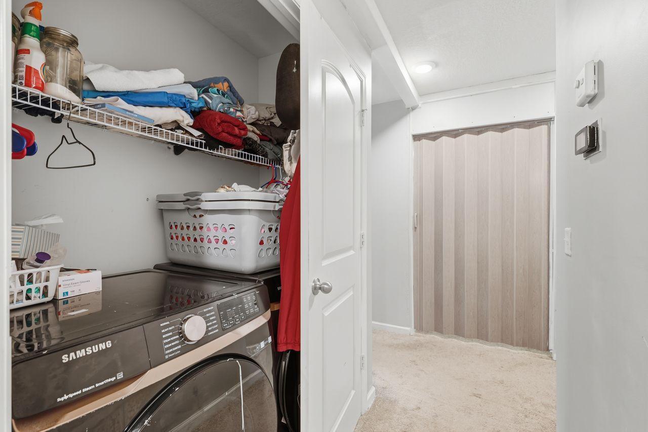 Laundry hookups in hallway closet