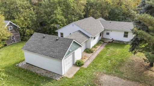 New roof, gutters, LP siding, garage door, newer windows....