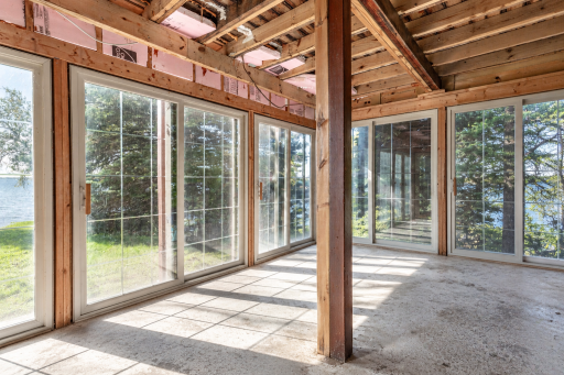Virtual edit showing empty lower level sunroom