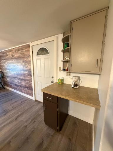 door to attached garage and organized drop zone