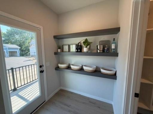 Easy access from your kitchen to grill deck and backyard and your mail!