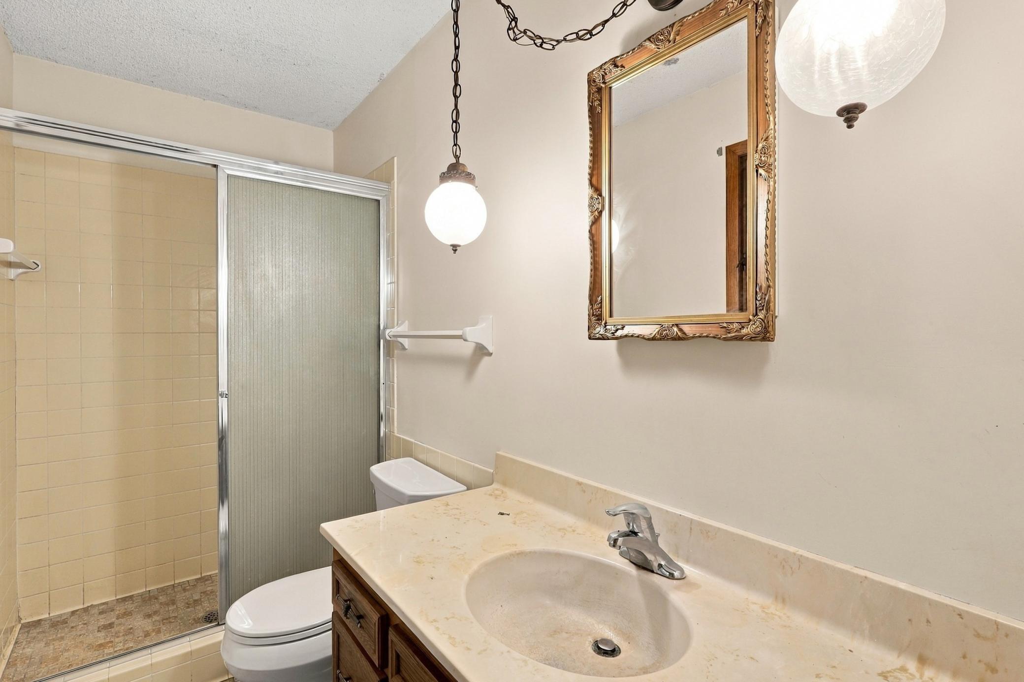 Private primary three-quarter bath adds convenience to the owner's suite.