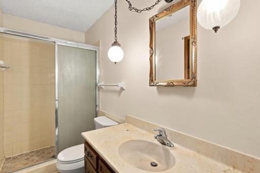 Private primary three-quarter bath adds convenience to the owner's suite.