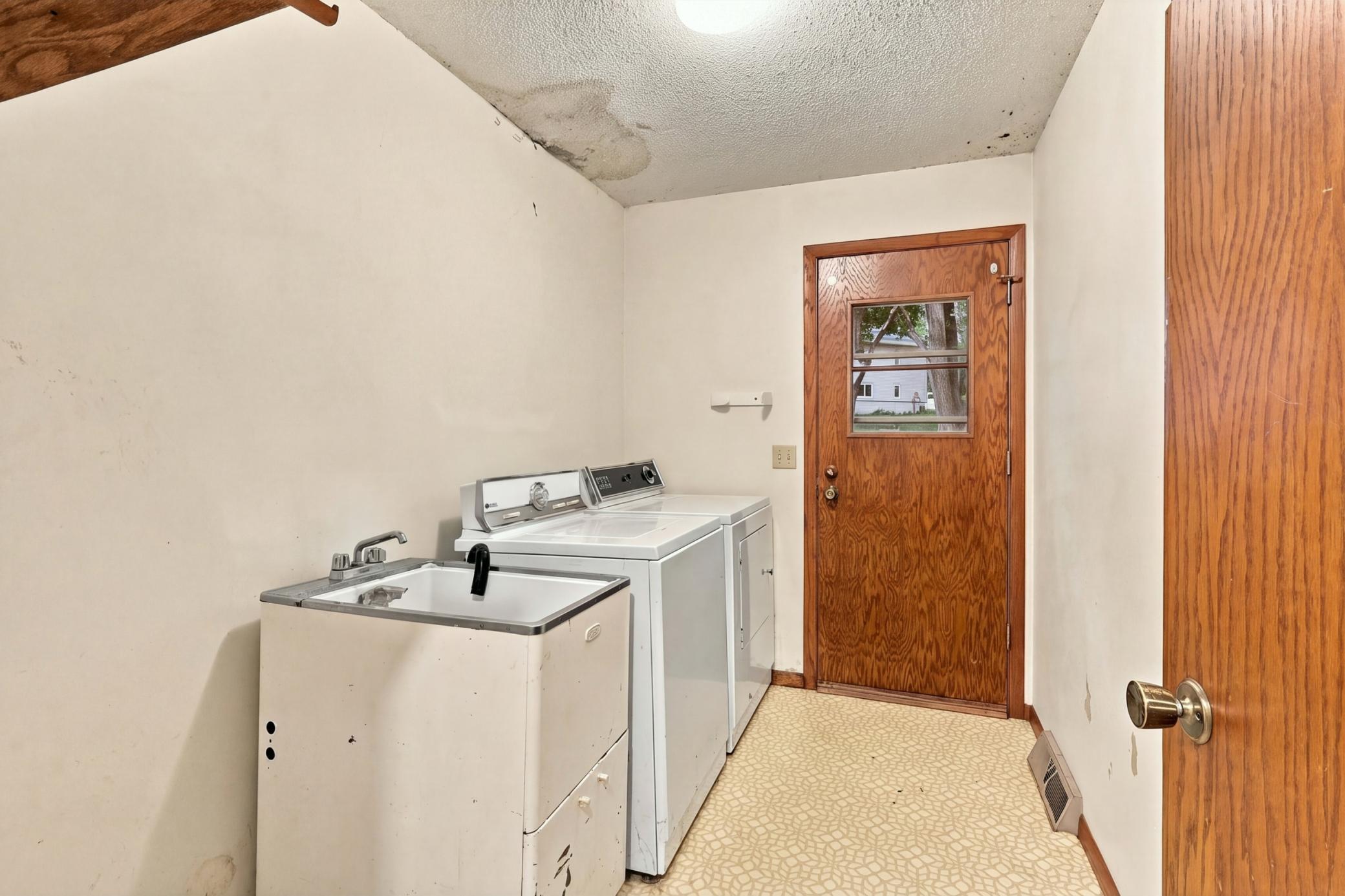 Main-floor laundry offers practical convenience with an opportunity to personalize the space to your needs.