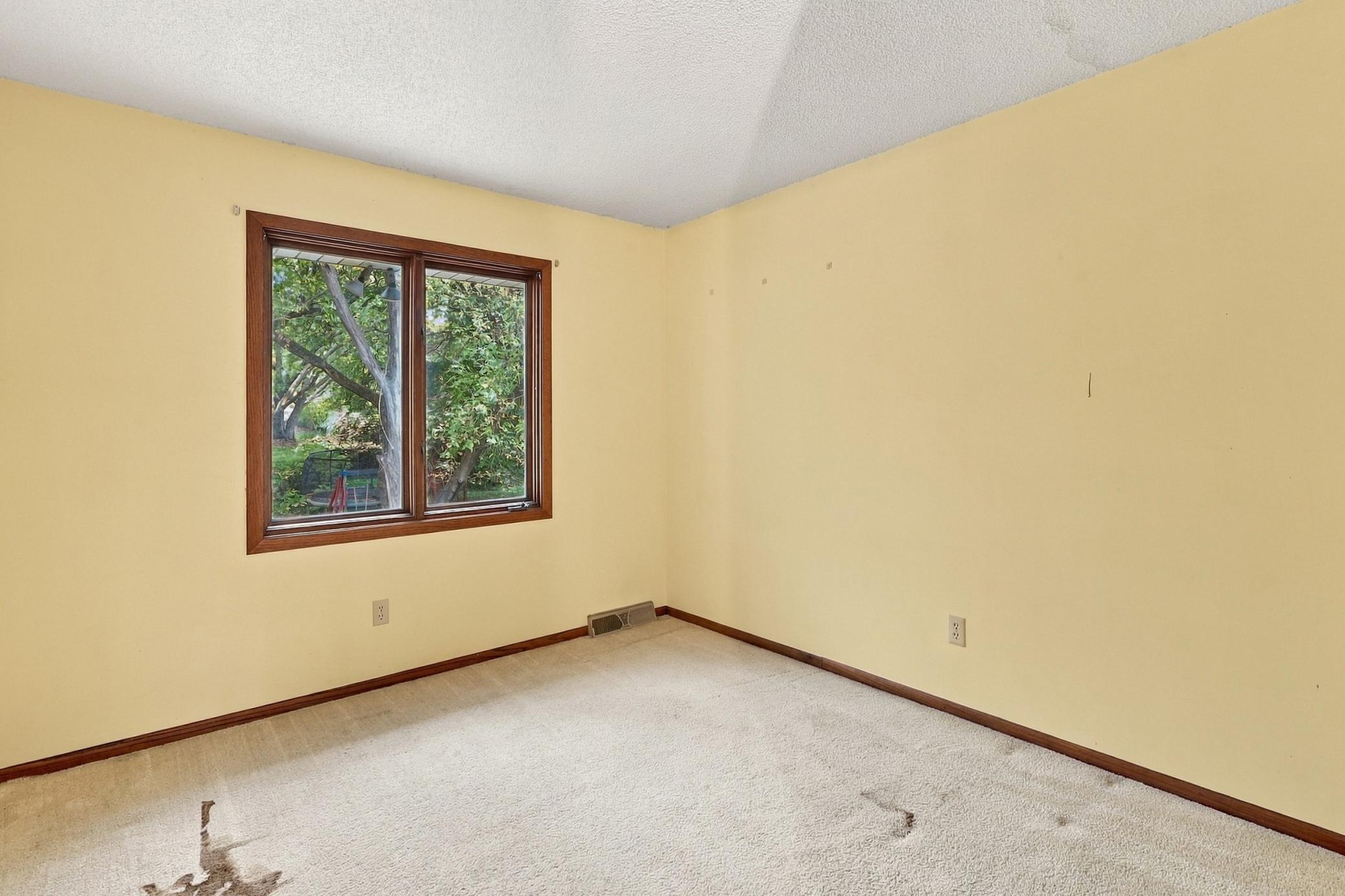 Four bedrooms provide options for guests, a home office, or additional living space.
