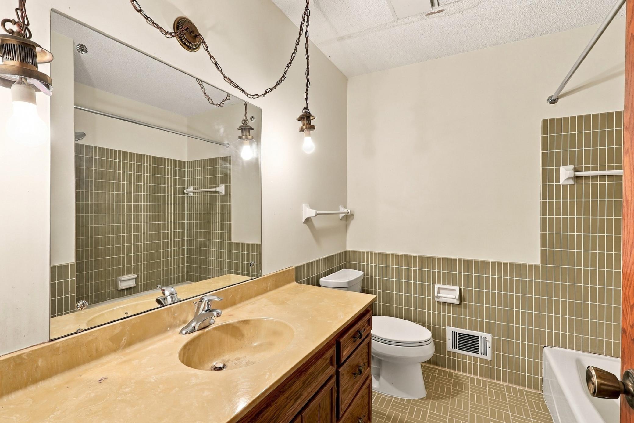 Guest full bathroom serves the additional bedrooms and household needs.