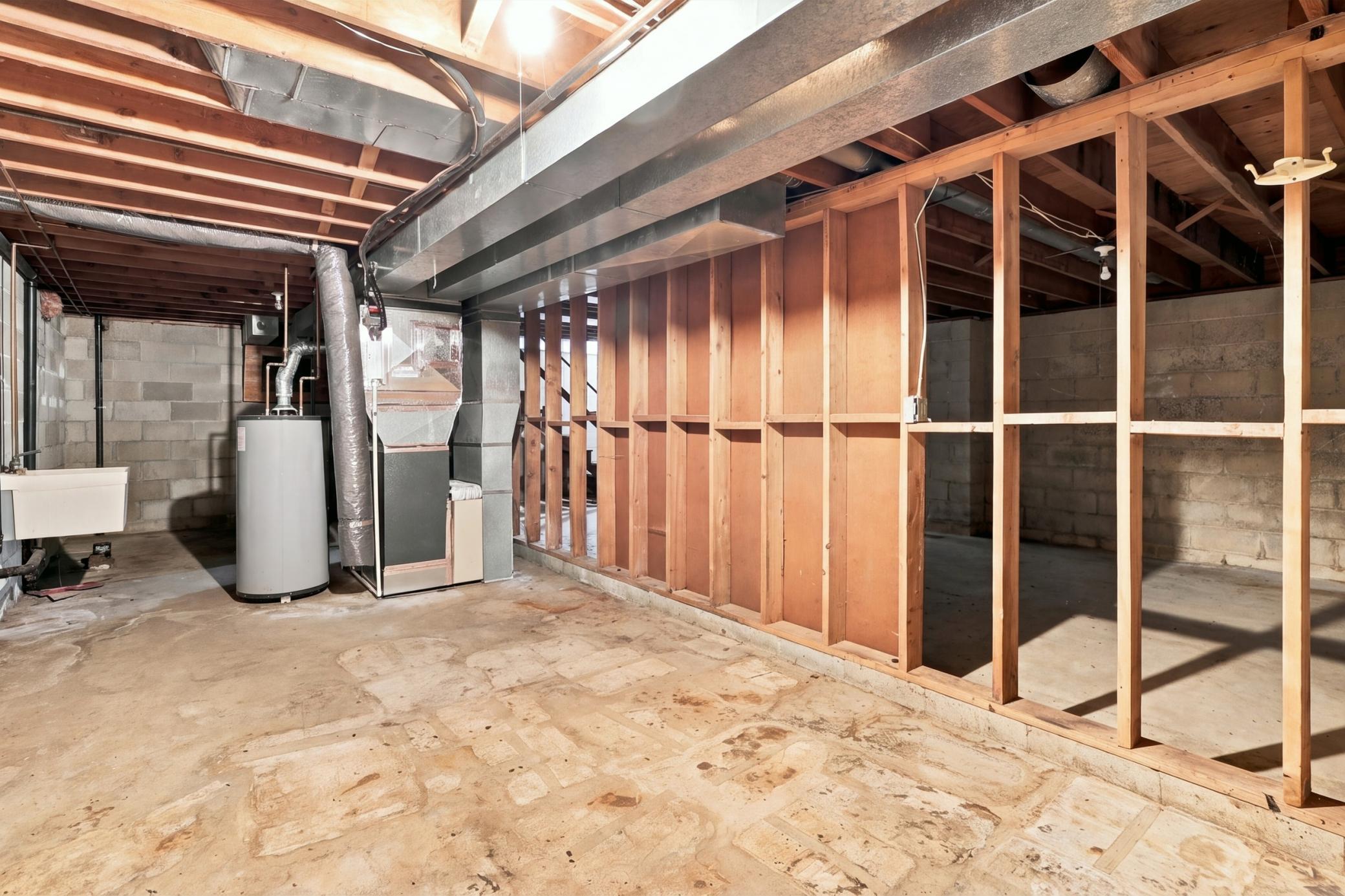 Unfinished basement offers additional space with potential for future improvements, storage, or customized use.