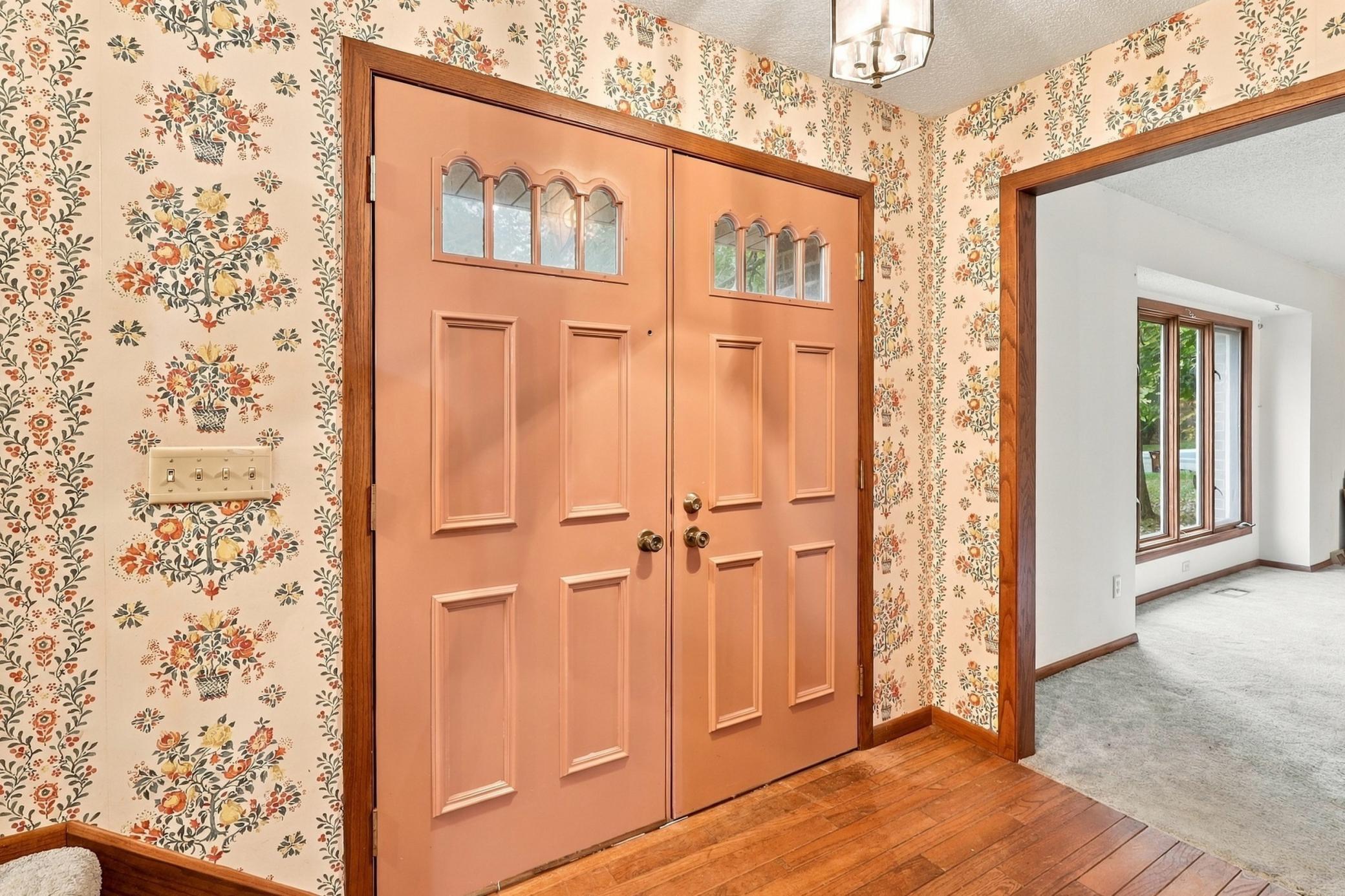 Hardwood flooring in the entry creates a welcoming first impression and adds character to the home's interior.