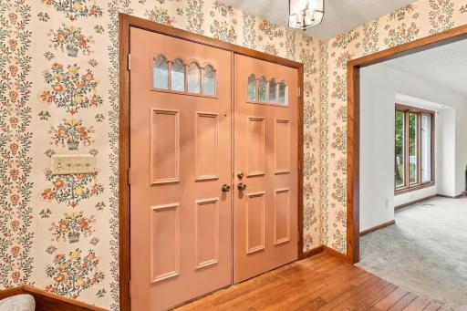 Hardwood flooring in the entry creates a welcoming first impression and adds character to the home's interior.