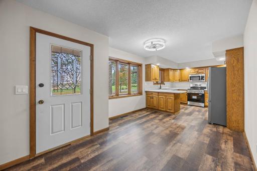 The fully renovated rambler features new kitchen countertops and stainless-steel appliances, adding a fresh, modern touch to the heart of the home.