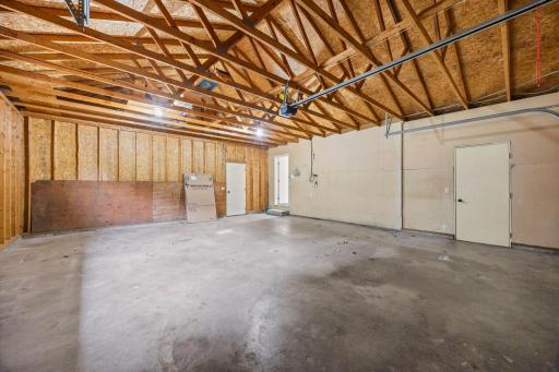 The oversized garage offers plenty of space for parking, storage, hobbies, or whatever suits your needs.