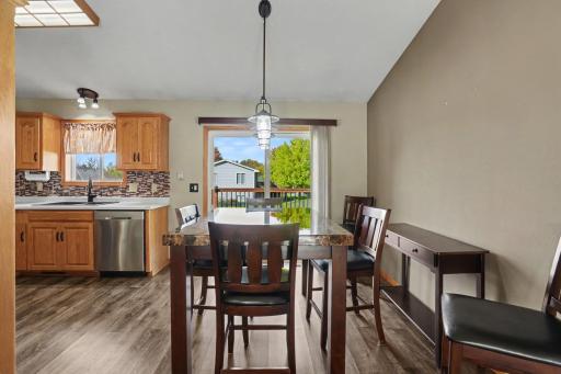 Sliding doors to your newer deck and meticulously maintained backyard