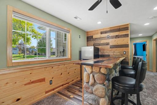 Custom bar with butcher block top & beverage fridge