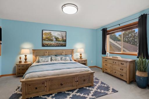 Upper-level 2nd bedroom. This photo has been virtually staged
