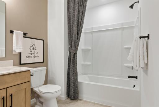Upstairs hall bathroom with large tub/shower