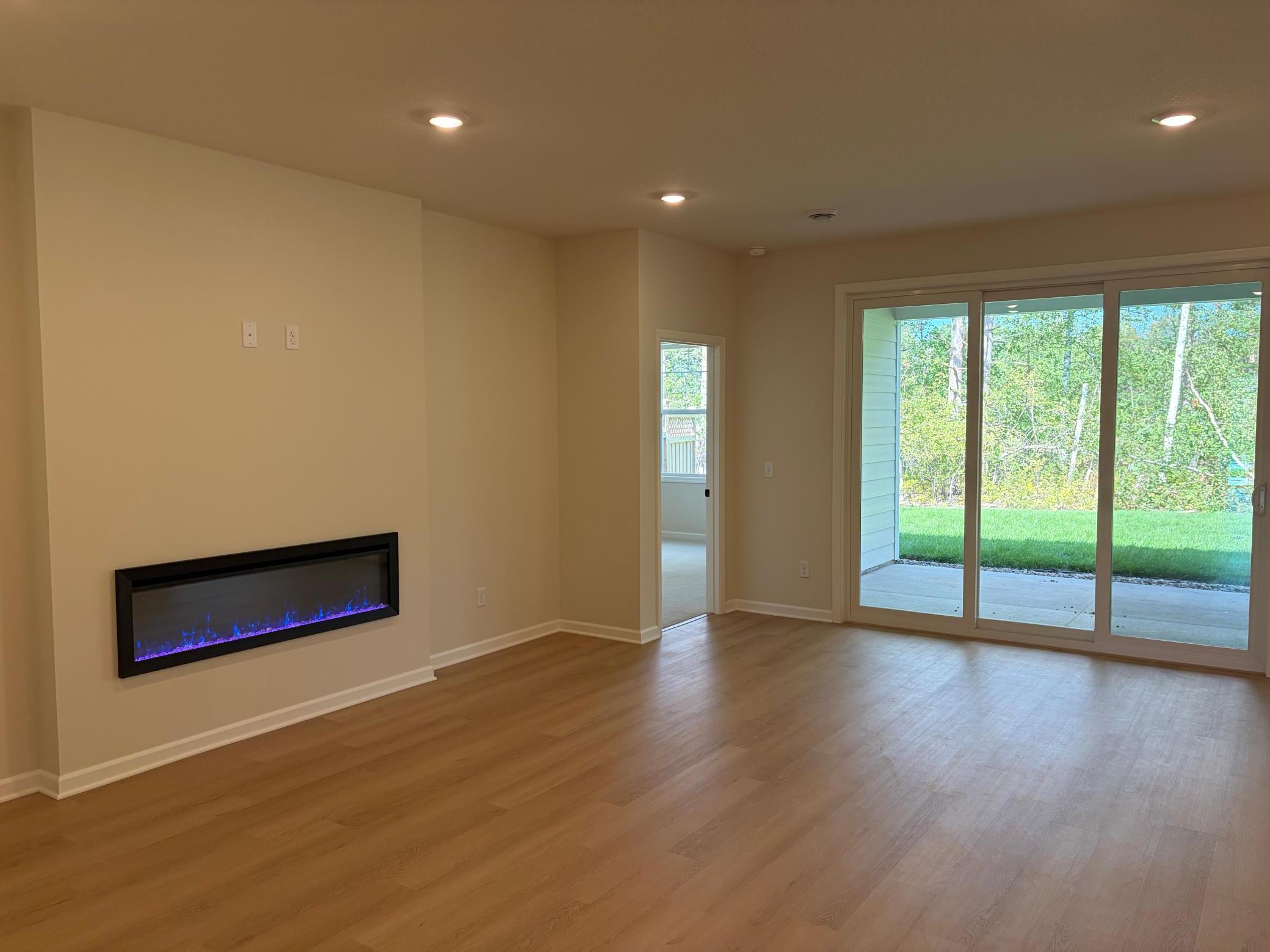 Walking into the living room you encounter a breath taking view of the patio and private back yard space.