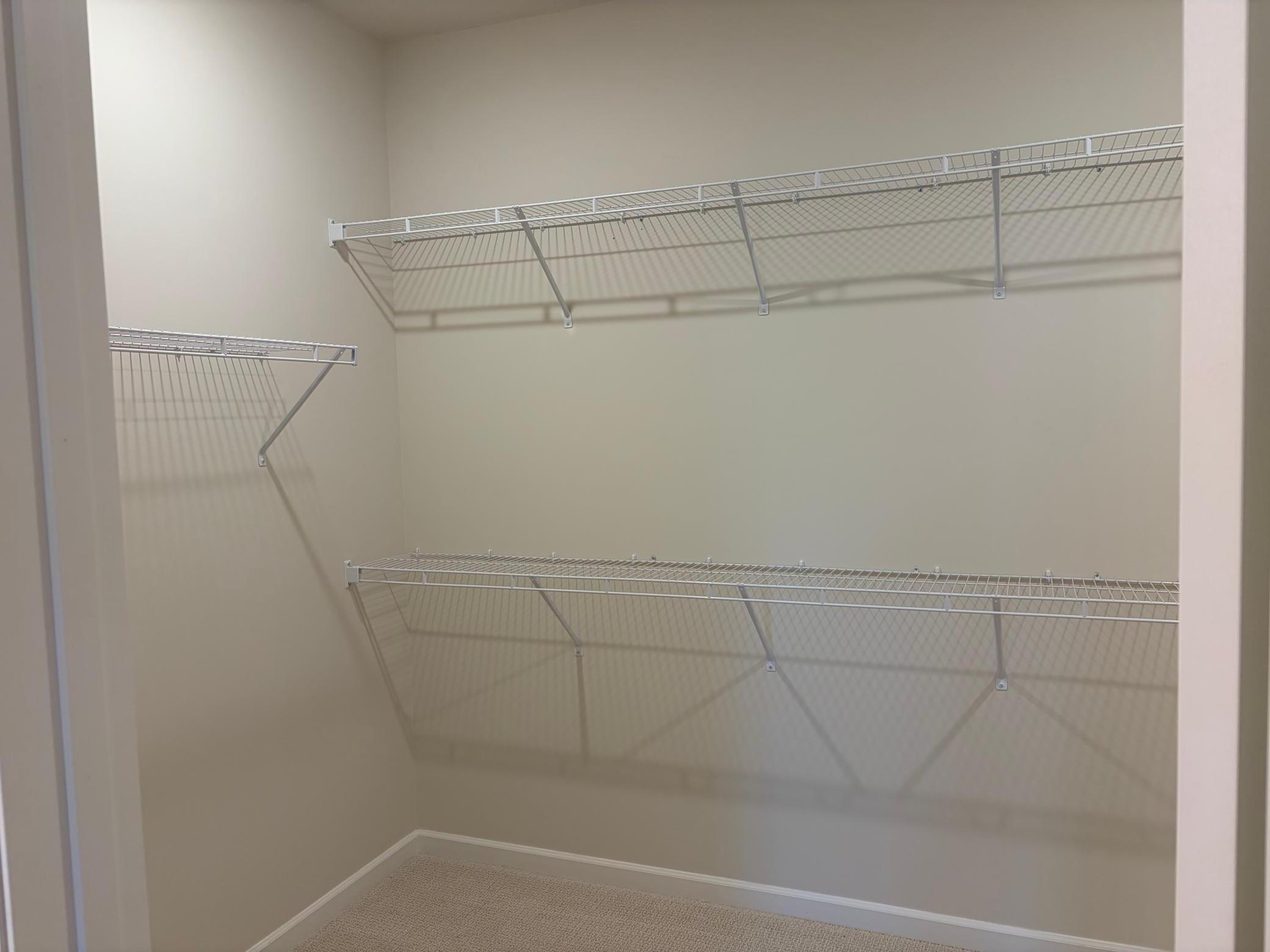 Massive walk-in closet, check! With plenty of shelving to take on even the biggest garment collections.
