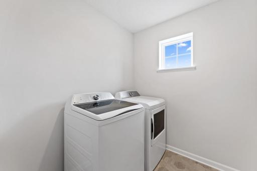 Upper Level Laundry Room includes washer and dryer