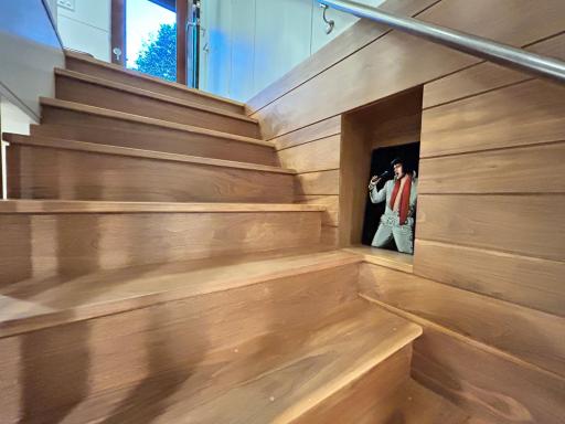 Close up of custom stairs overseen by Elvis.