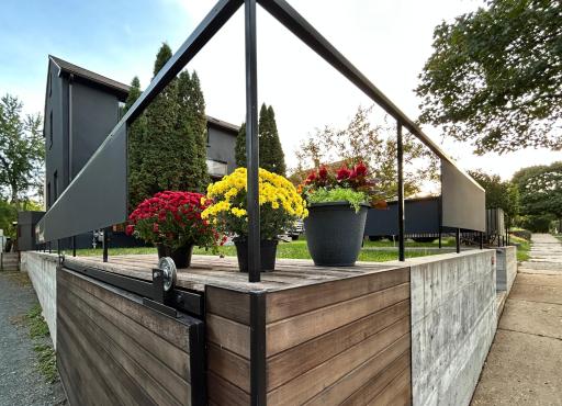 Notice yet MORE impressive details. The sliding door hides the garbage/recycling cubby.