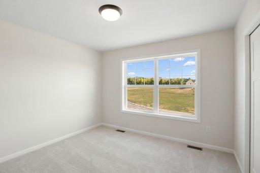 The additional three bedrooms upstairs have plenty of natural light coming into them. *Model home photos, colors and selections may vary.*